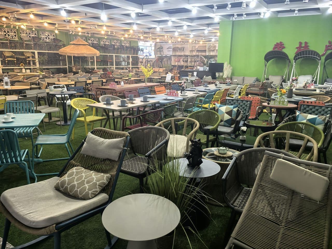 Factory showroom with outdoor furniture on display, photographed during a Tasman Global supplier audit in China